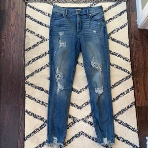 Distressed ankle jeans